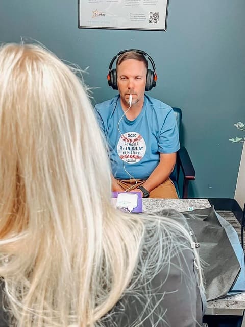 Male Patient Testing Lenire Device at Alaska Hearing & Tinnitus Center