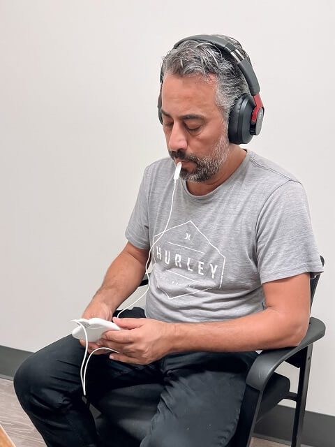 A Patient testing the Lenire Device at Alaska Hearing & Tinnitus Center