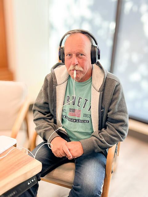 A Male Patient Testing the Lenire Device