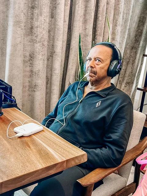 A Male Patient Testing the Lenire Tinnitus Treatment Device At Alaska Hearing & Tinnitus Center