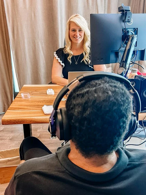 Dr. Emily McMahan With Patient During Lenire Tinnitus Treatment